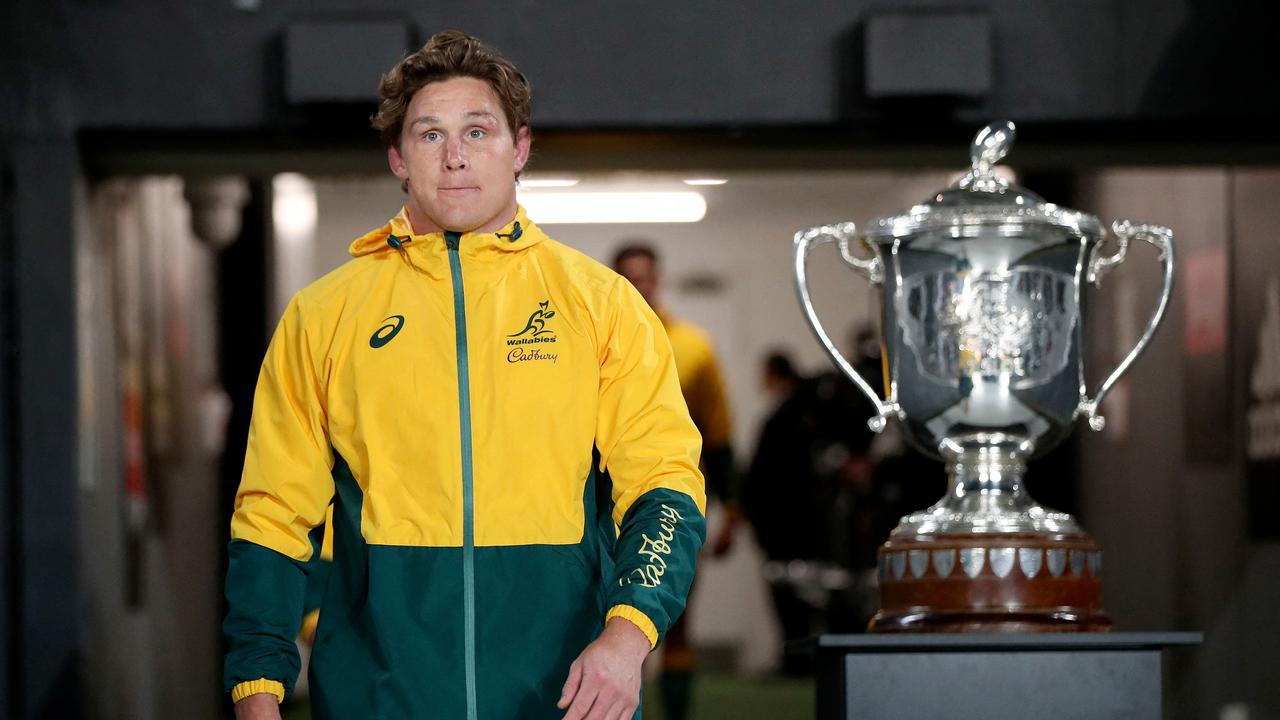 Australia's captain Michael Hooper leads out the team past the Bledisloe Cup last year. Picture: AFP