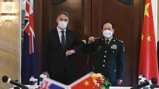 Richard Marles meets China's Defence Minister Wei Fenghe on the sidelines of the Shangri-La Dialogue summit in Singapore. Picture AFP.