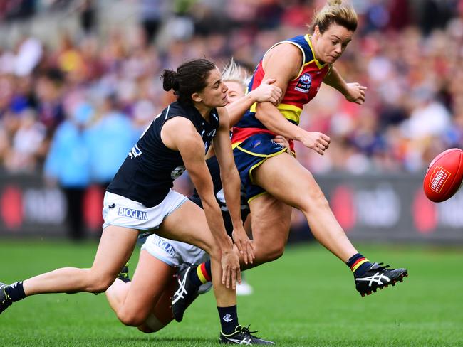 Crows vice-captain Courtney Cramey kicks under pressure during the AFLW Grand Final match between Adelaide and Carlton at Adelaide Oval on March 31, 2019. Picture: MARK BRAKE/GETTY IMAGES