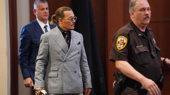 Depp re-eenters the courtroom after a break today. Picture: AFP