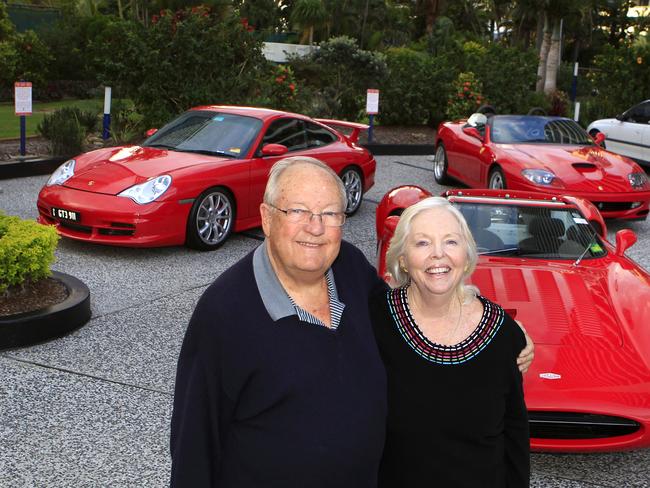 The late Digby Cooke with partner Gwen in front of their Jaguar XJ13 replica, Ferarri and Porsche. Picture: Bruce Long