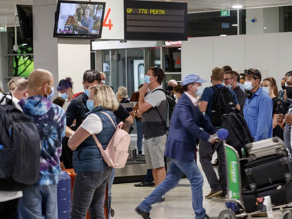 Passengers arriving from Perth at Melbourne Airport as Perth. Picture: David Geraghty