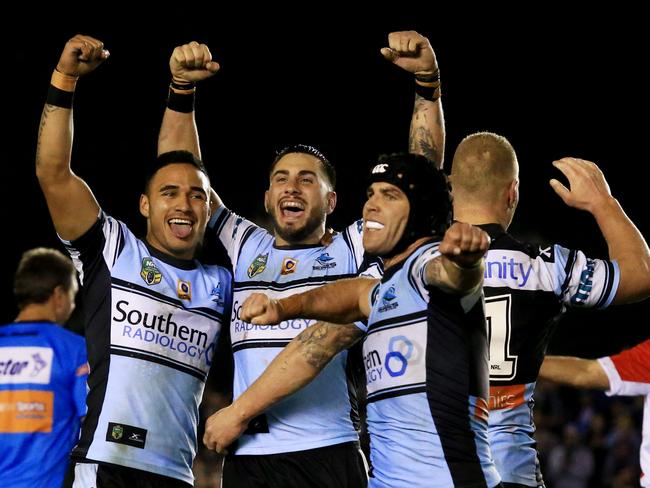 Valentine Holmes, Jack Bird and Michael Ennis of the Sharks celebrate their win during the Cronulla Sharks v North Queensland Cowboys NRL round 14 game at Shark Park, Cronulla. pic Mark Evans