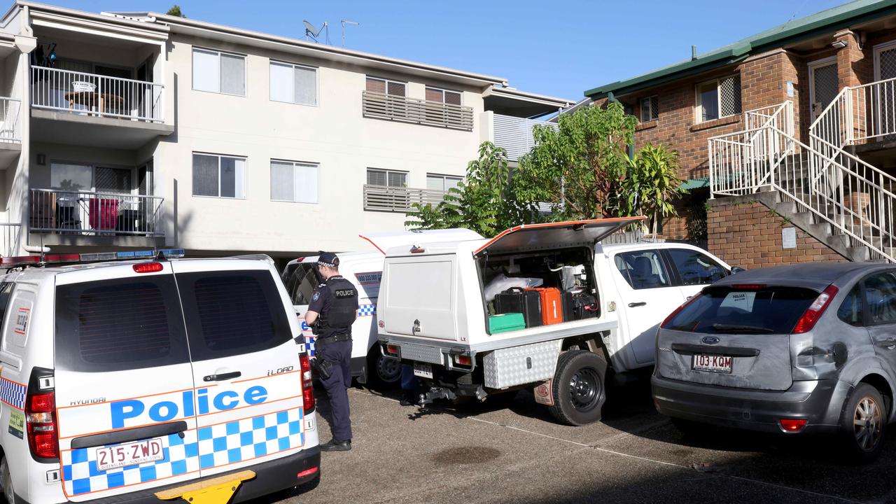 Police at an Annerley unit complex where a woman was found dead on Thursday night. Picture: Steve Pohlner