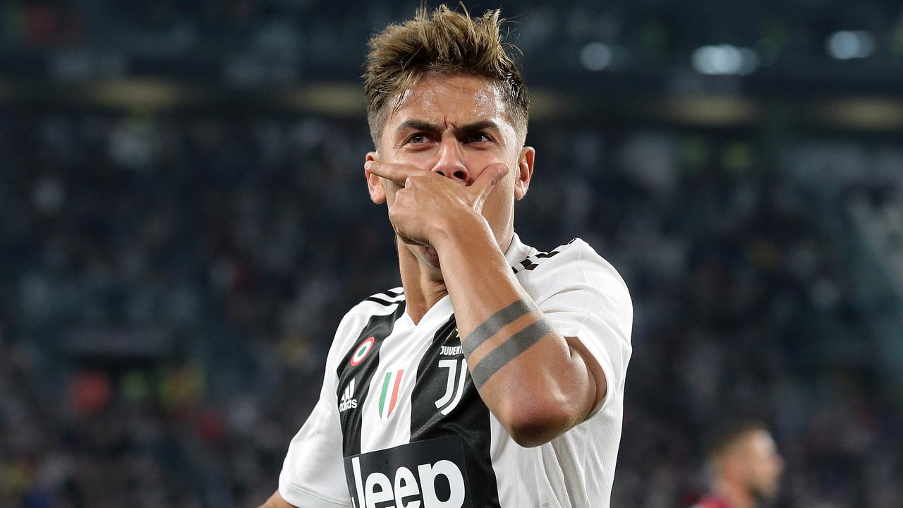 Turin, Italy - 26 June, 2020: Paulo Dybala (C) of Juventus FC celebrates  with Cristiano Ronaldo (R) and Federico Bernardeschi (L) of Juventus FC  after scoring a goal during the Serie A