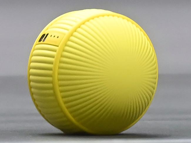 Ballie, a round yellow life companion robot that can react and interact with its owner. Picture: AFP