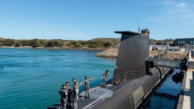 Crew members are seen working onboard HMAS Rankin, a Collins Class submarine at HMAS Stirling, Western Australia in March this year. Picture: NCA NewsWire