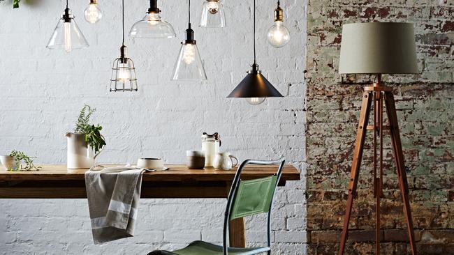 Pared back fittings like these pendant lights from Brilliant Lighting work in cafes and homes alike.