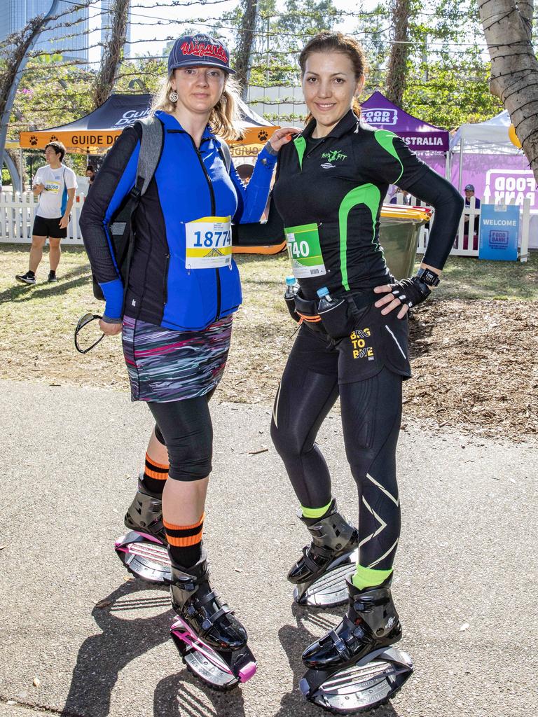 Simona Adochiei from Ormiston and Magda Xantopol from Shailer Park at the Bridge to Brisbane 2019 at South Bank, Sunday, August 25, 2019 (AAP Image/Richard Walker)