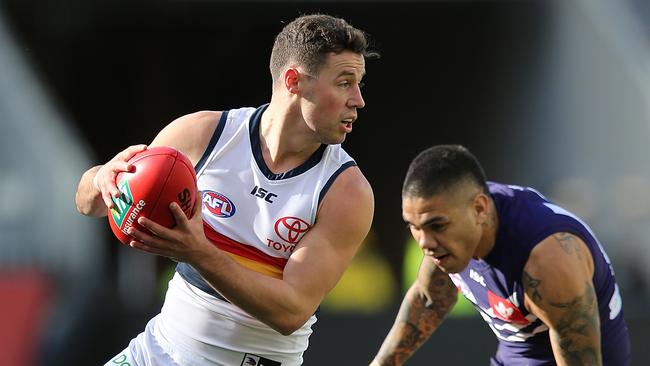 Luke Brown evades Michael Walters. Picture: Getty Images