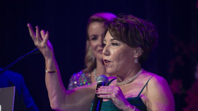 Kathleen Simpson wins the Professionals Award presented by Ryan Keen and Belinda Dawes at the Gold Coast Bulletin Women of the Year Awards. Picture: Glenn Campbell