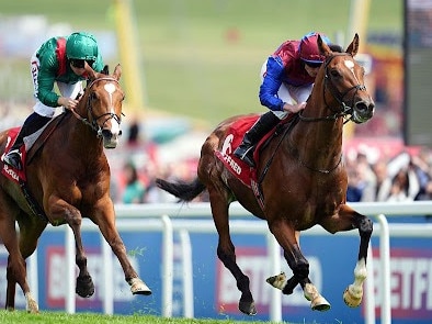 Jan Brueghel ridden by Ryan Moore wins the Betfred Coronation Cup ahead of Calandagan ridden by Mickael Barzalona at Epsom Downs Racecourse. Picture date: Friday June 6, 2025. (Photo by Adam Davy/PA Images via Getty Images)