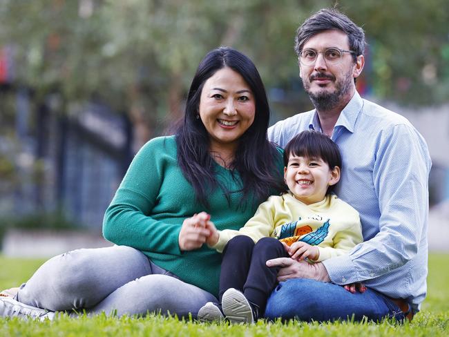 Rena Oura and husband David Parks with son Hugo outside the Greenwood child care centre in Waterloo, which has announced it is shutting down. Picture: Sam Ruttyn