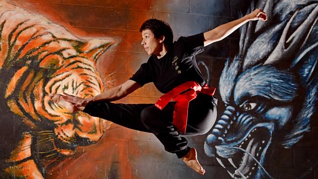 Sarah Arratoon is the first female to be awarded the rank of Shifu (master) at Kung Fu Academy in Castle Hill. Pictures: Troy Snook