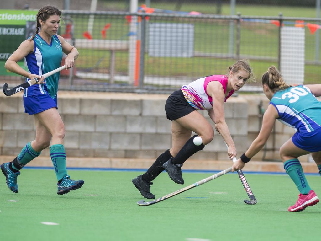 Emma Pearce (centre) of Gold Coast against Tweed in Hockey Queensland Championships at Clyde Park, Sunday, May 2, 2021. Picture: Kevin Farmer