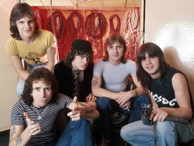 In Holland in 1976 ... AC/DC, from left, Mark Evans, Bon Scott, Angus Young, Phil Rudd and Malcolm Young. Picture: Scope Features / Peter Mazel