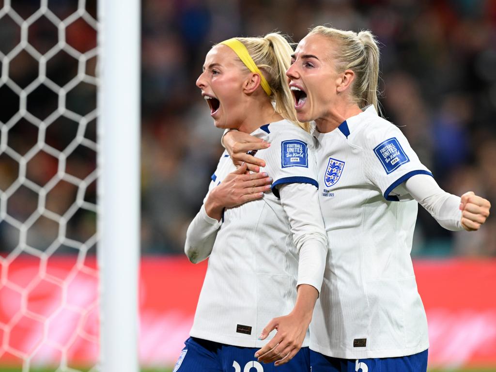 England duo Chloe Kelly (L) and Alex Greenwood celebrate their penalty shootout victory. Picture: Getty