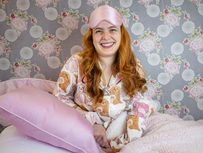 Katelyn Davey getting cosy at a Peter Alexander store in Melbourne for World Sleep Day, new sleep study out showing Aussies don't get enough sleep, Picture by Wayne Taylor 14th March 2024