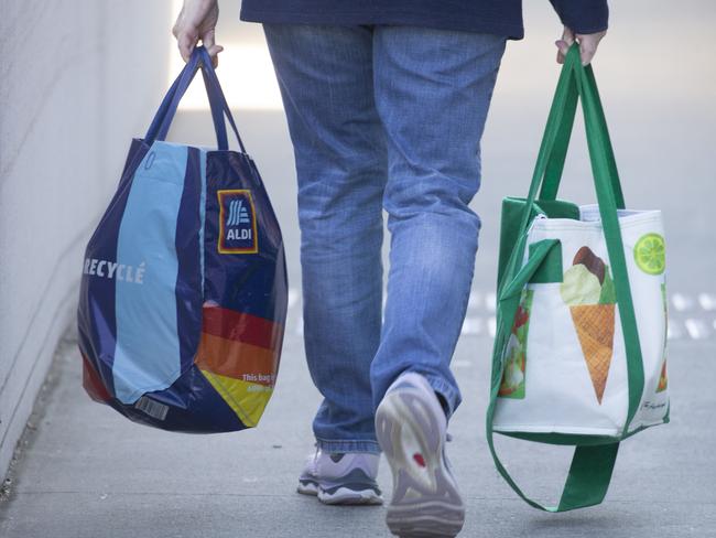 BRISBANE, AUSTRALIA - NewsWire Photos - JUNE 19, 2024: Generic photo of Australian shopping centre ALDI and Woolworths bags.Picture: NewsWire / Glenn Campbell