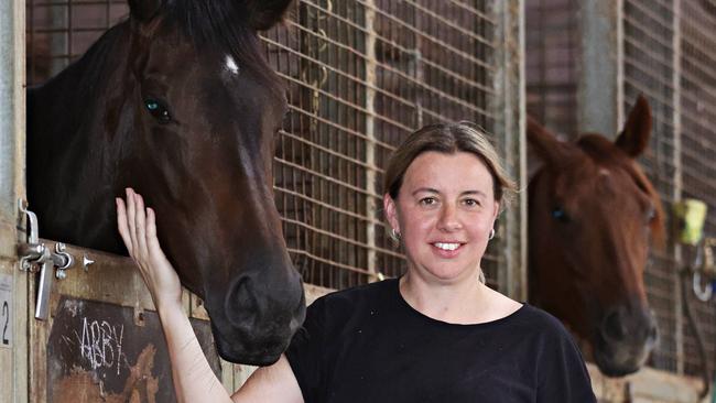 SYDNEY, AUSTRALIA. DECEMBER 7, 2023. Cherie Curtis with "I saw the light" at her stables in Rosehill Gardens. Picture: Adam Yip