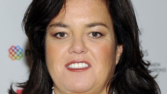 FILE - In this April 11, 2011 file photo, television personality Rosie O'Donnell attends the New York Women in Communications' 2011 Matrix Awards in New York. O�Donnell and her girlfriend, Michelle Rounds, are engaged. O�Donnell�s publicist and a spokesman for the Oprah Winfrey Network say the host of �The Rosie Show� told her studio audience about the engagement Monday during a commercial break. (AP Photo/Evan Agostini, file)