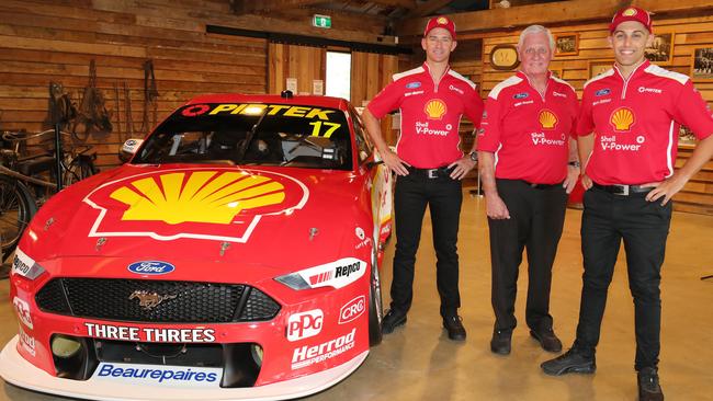 Will Davison (left) and Anton De Pasquale (right) standing beside team boss Dick Johnson.