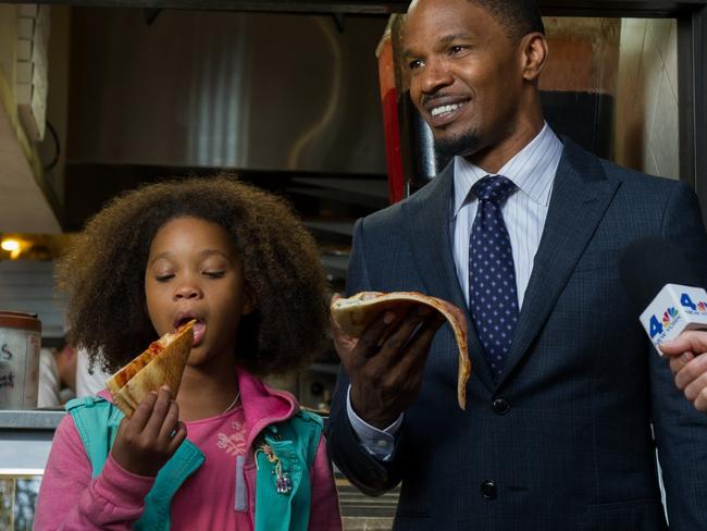 Adorable girl ... Quvenzhané Wallis with Jamie Foxx in Annie.