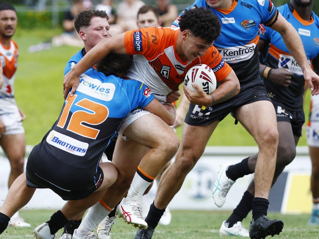 Nathan Kegg-King takes a charge for the Brisbane Tigers. Picture: Brendan Radke