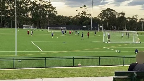 Teenagers and young men, flouting COVID-19 social distancing rules, playing a game of 11-a-side soccer on one of the playing fields at Lionel Watts Reserve, Frenchs Forest. Picture: Facebook