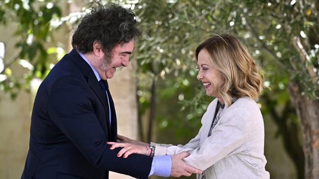 Prime Minister of Italy Giorgia Meloni welcomes President of Argentina Javier Milei on day two of the 50th G7 summit at Borgo Egnazia.*