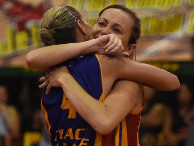 Darwin Basketball Association League women's grandfinal Lightning V TV Jets - Jets players Kylie Duggan and Sam Rioli celebrate their win.