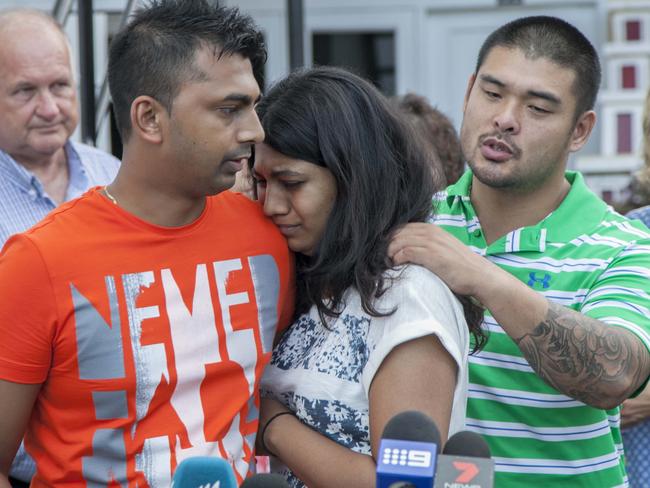 Grief ... Chintu Sukumaran and Michael Chan comfort Brintha Sukumaran as they talk to journalists at a hotel in Cilacap. Picture: Supplied