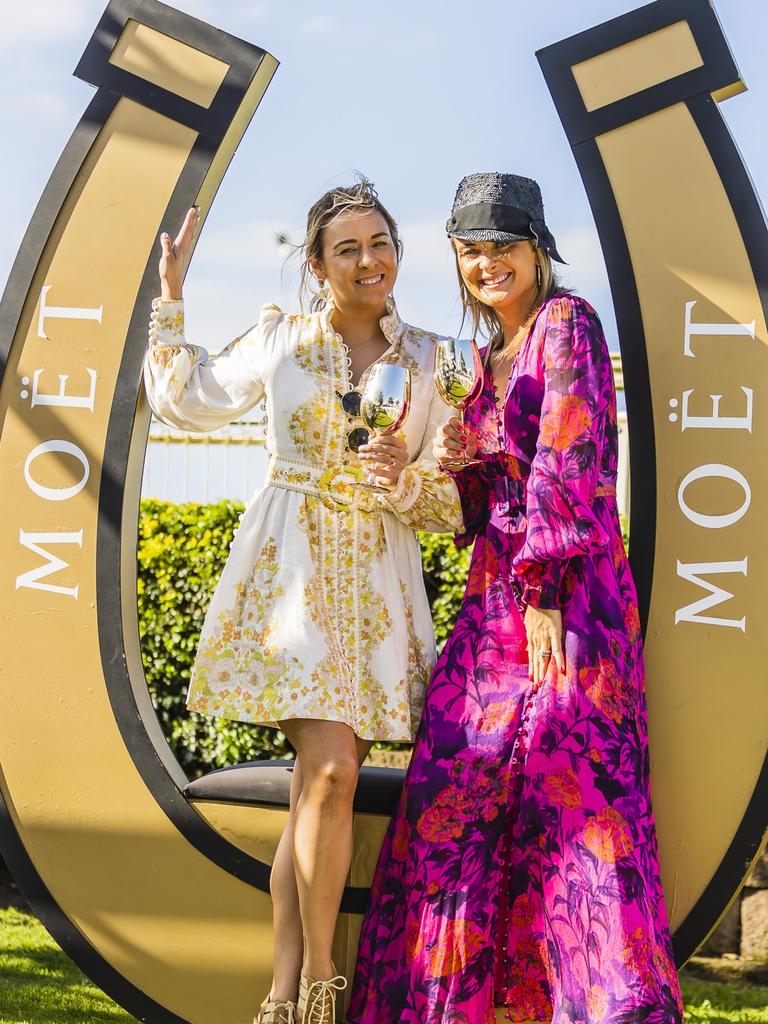 Carina Mystec and Rachel Thaiday at Doomben Racecourse for Melbourne Cup Day. Socials: Damien Anthony Rossi | Pictures: Jared Vethaak