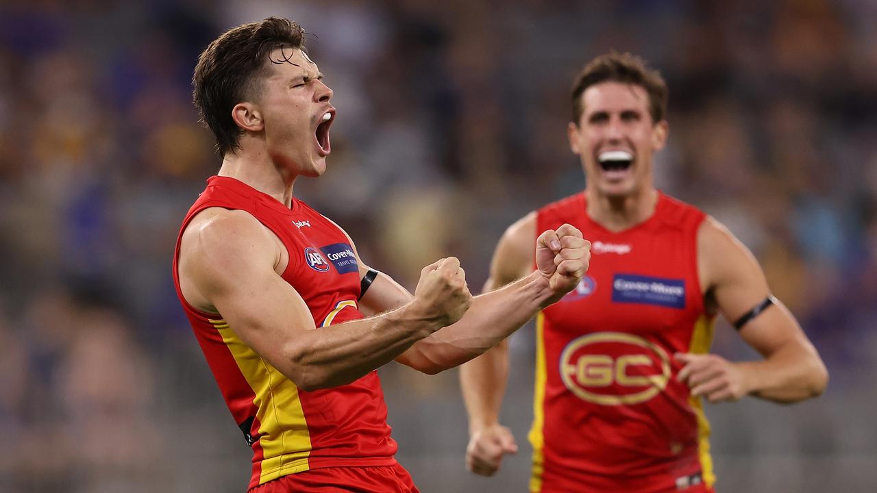 Ben Ainsworth celebrates the Gold Coast’s first-ever win in Perth. Picture: Paul Kane