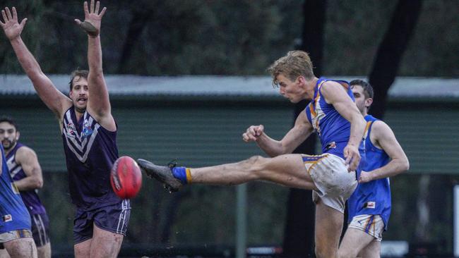 EFL: Heathmont’s Cameron Osborne gets a kick. Picture: Valeriu Campan