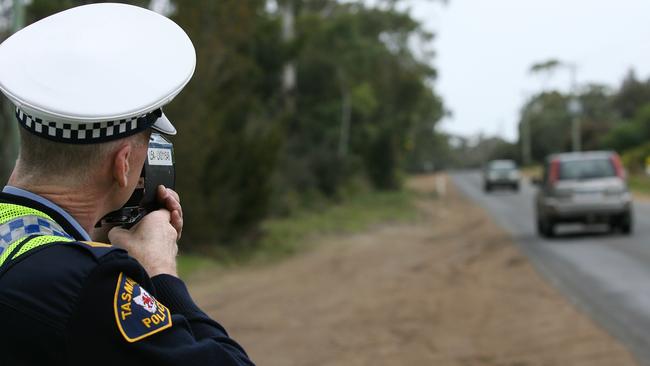 Sergeant Nicholas Hodgkinson demonstrating one of the deterrents, a radar speed gun