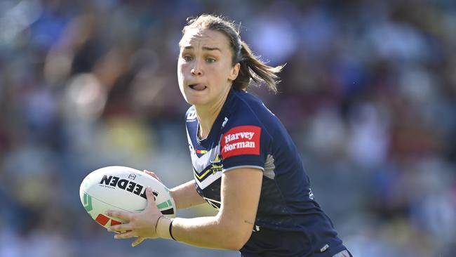 Kirra Dibb of the Cowboys runs the ball during the round seven NRLW match between North Queensland Cowboys and St George Illawarra Dragons at Queensland Country Bank Stadium. (Photo by Ian Hitchcock/Getty Images)