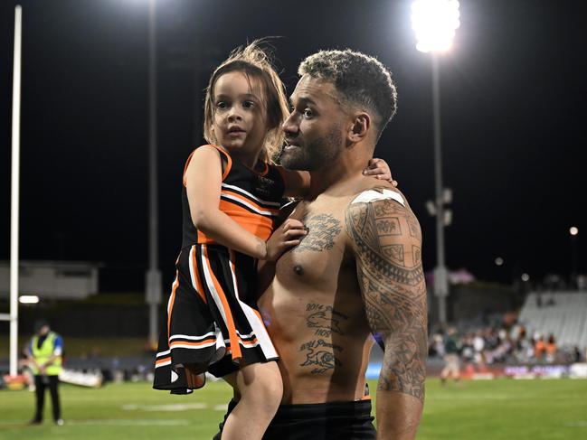 Wests Tigers captain Apisai Koroisau with his daughter. Picture: NRL Photos/Gregg Porteous