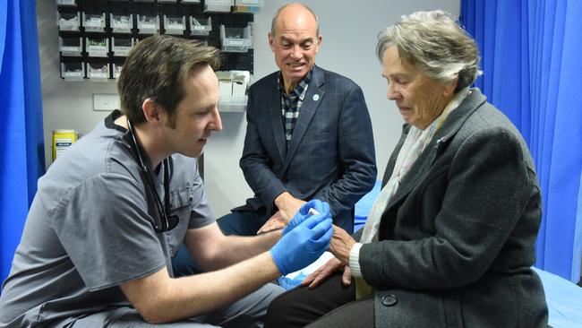 Launceston Health Hub owner Dr Jerome Muir-Wilson with Health Minister Guy Barnett and urgent care clinic patient Jackie Hannaford. Picture: Alex Treacy