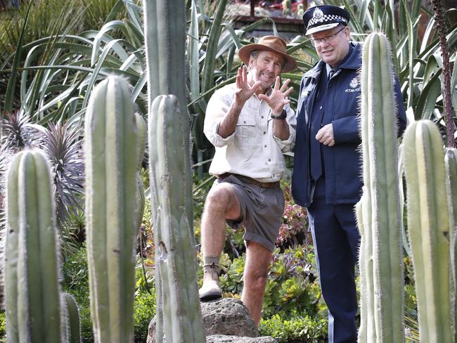 Graham Ashton gets some advice from Russell Coight before his fundraising walk. Picture: David Caird