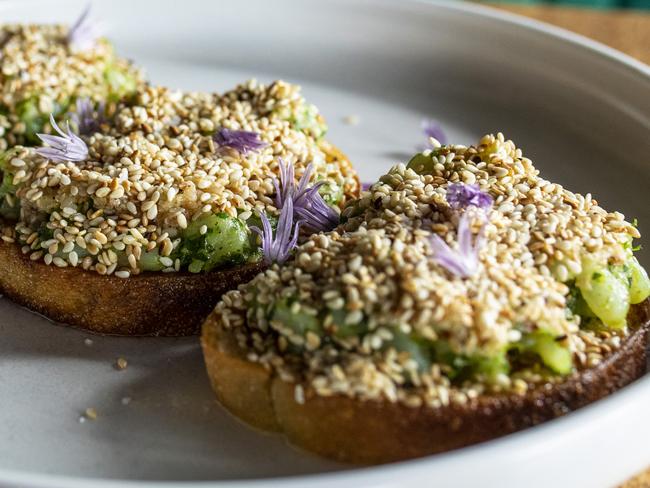 The rich and creamy prawn rillette with wakame butter and pink finger lime. Picture: Eddie Safarik