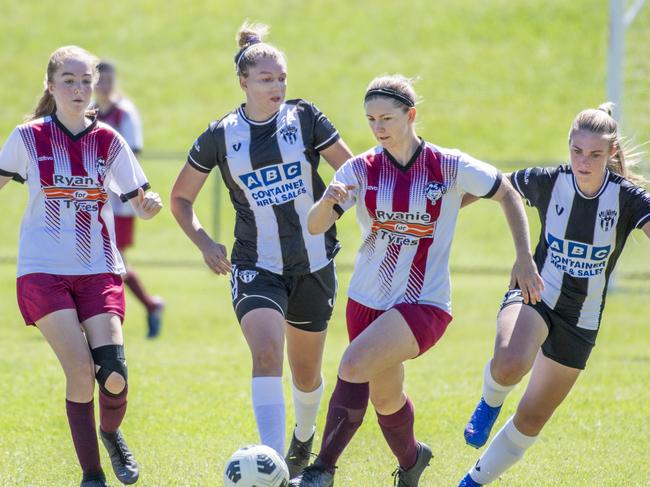 Maegan Campbell, Warwick and Courtney Morris, Willowburn. Willowburn FC vs Warwick Wolves, 2021 TFL - Premier Ladies. Sunday, April 11, 2021. Picture: Nev Madsen.