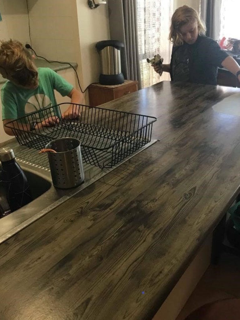 After the makeover, the kitchen bench could have easily passed for an entirely new piece. Picture: Facebook