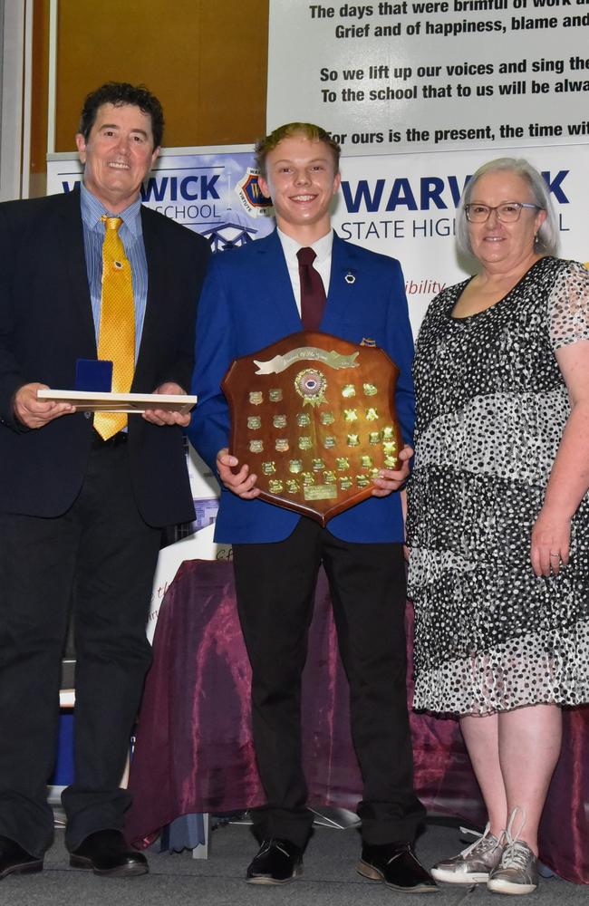 Southern Downs councillor Marco Gliori (L), Warwick State High School school captain Ryan Callow and Janet Reid (R) at their 2023 awards night. Photo: Contributed