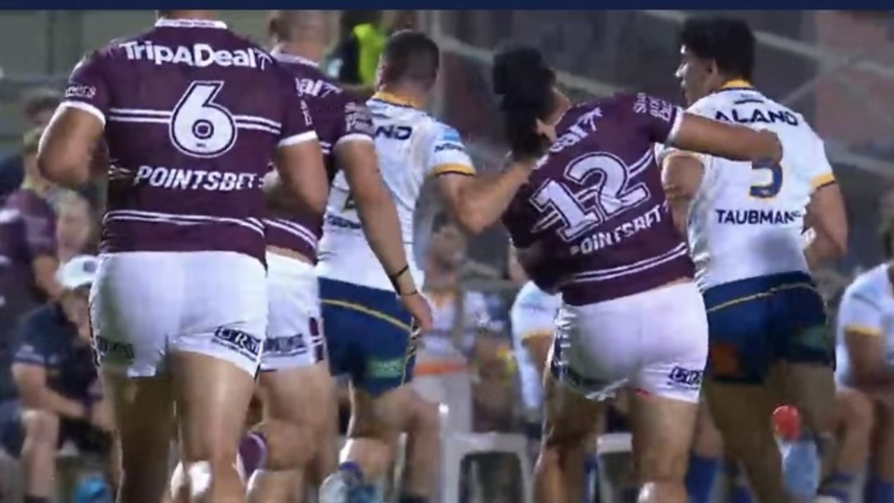 Eels halfback Mitchell Moses pulls the hair of Manly's Kelma Tuilagi at 4 Pines Park