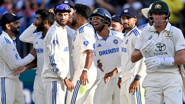 India celebrates after Jasprit Bumrah claimed the wicket of Australia's Marnus Labuschagne in the final over of day three in Perth. Picture: AFP