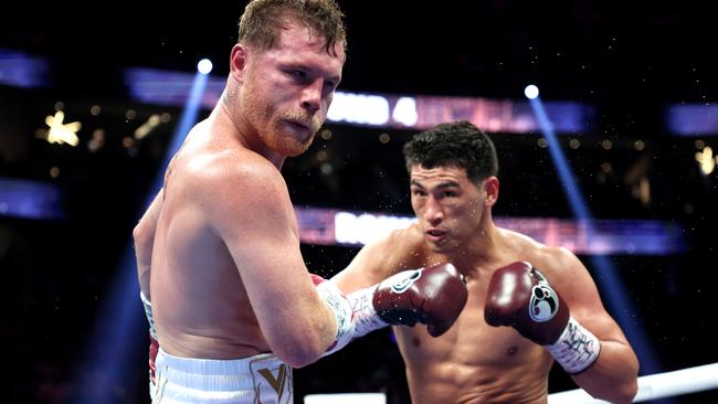 Dmitry Bivol punches Canelo Alvarez during their WBA light heavyweight title fight. Photo by Al Bello/Getty Images
