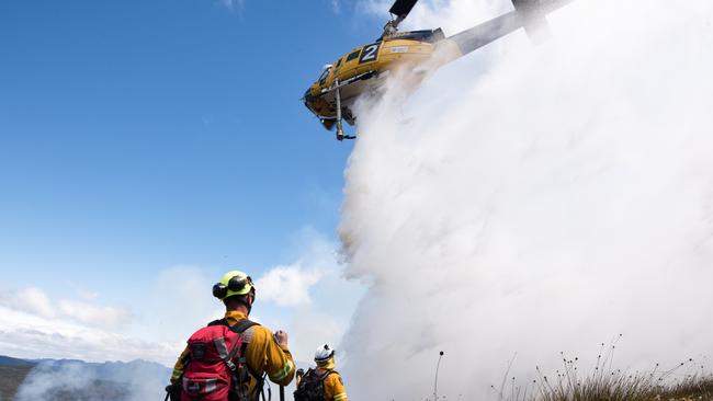 BATTLEFRONT: Tasmania Fire Service crews at the Gell River fire in January. Picture: WARREN FREY/TASMANIA FIRE SERVICE