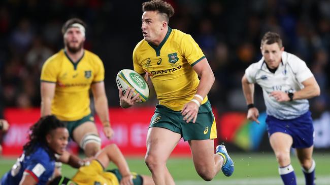 Tom Banks of the Wallabies makes a break at Bankwest Stadium.