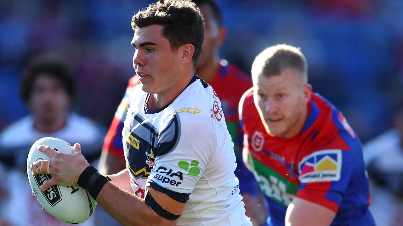 NEWCASTLE, AUSTRALIA - AUGUST 17: Jake Clifford of the North Queensland Cowboys scores a try during the round 22 NRL match between the Newcastle Knights and the North Queensland Cowboys at McDonald Jones Stadium on August 17, 2019 in Newcastle, Australia. (Photo by Tony Feder/Getty Images)